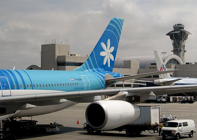 Our Air Tahiti Nui plane, with tiare flower on the tail