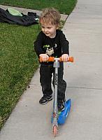 Left click on photo. Then use 'next' and 'previous' arrows to scroll through album.