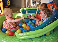 In the ball pit...with a book for Parker...as usual. :-)