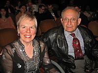 Left click on photo. Then use 'next' and 'previous' arrows to scroll through album.