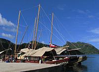 Vakas moored in Fare, Huahine