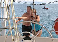 Sharon & John get back aboard. Martine stands by with the dinghy