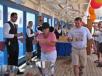 Carrying wine in sommelier's cup