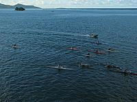 Canoes practicing (or racing?) beside the ship (taken from the veranda)
